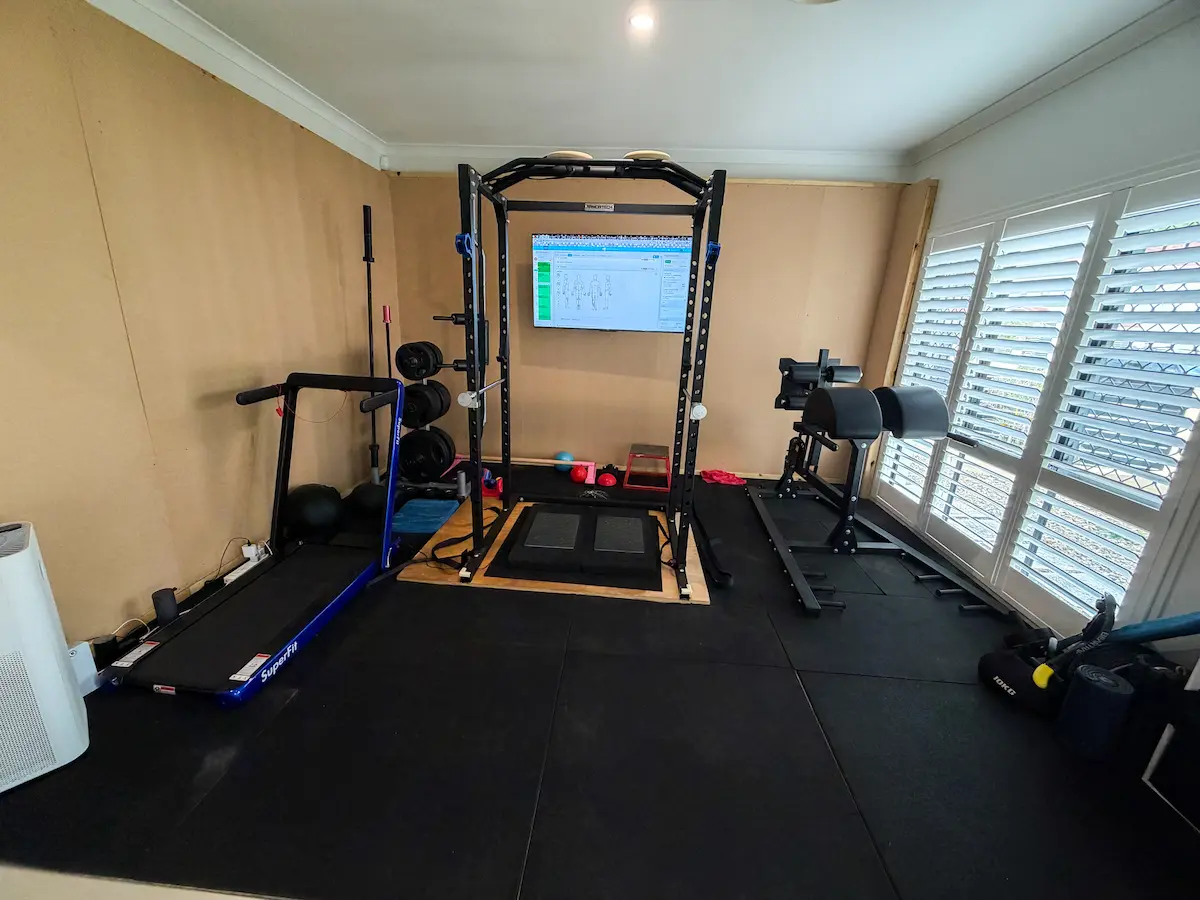 Heal Young Massage training and rehabilitation room at Varsity Lakes — equipped with exercise equipment and VALD ForceDecks technology.