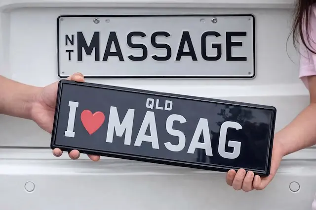 NT Massage number plate and QLD I Love Massage number plate — a reminder of Hill Yang's journey from the Northern Territory to the Gold Coast